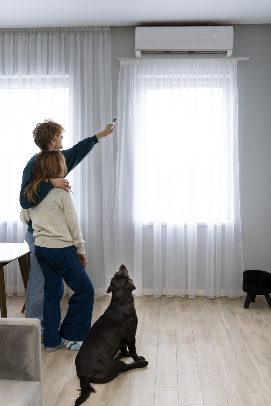 https://thermovac.ca/wp-content/uploads/2024/11/full-shot-couple-dog-home-1024x1536.jpg